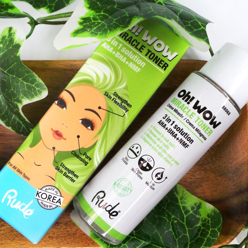 Kawaii Oh! Wow Miracle Toner 3 in 1 Solution on a wooden board surrounded by green leaves