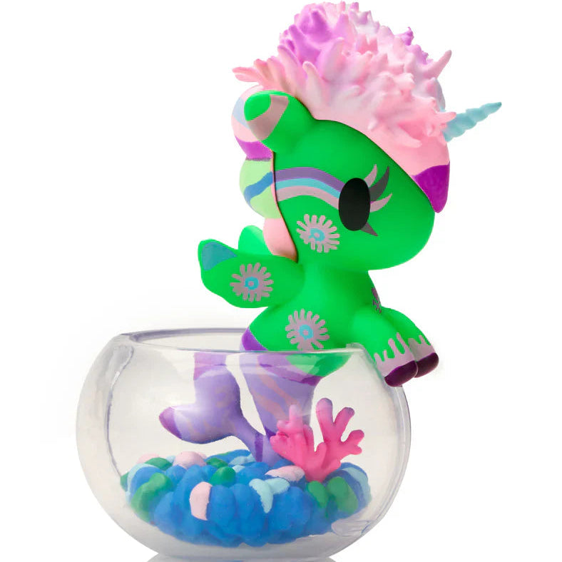 kawaii blind box unicorn figurine with a glass base on a white background