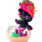 Colorful blind box unicorn figurine with a bowl and coral on a white background