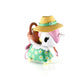 Kawaii Unicorn blind box figurine wearing a yellow hat and green dress with flowers on a white background