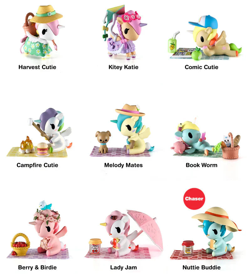 Collection of kawaii blind box figurines with various poses and accessories on a white background