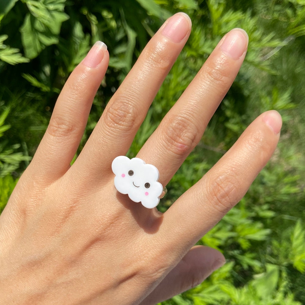 Hand Wearing Kawaii Cloud Ring on Middle Finger