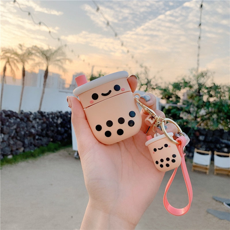 Hand Holding Boba Tea AirPods Case with Boba Tea Charm