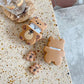 Back and Front View of Kawaii Bear Cookie Airpods Cases