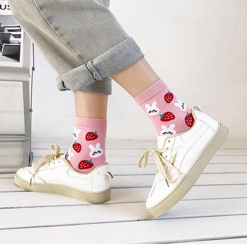 Model Wearing Kawaii Pink Bunnies and Strawberries Socks With White Sneakers