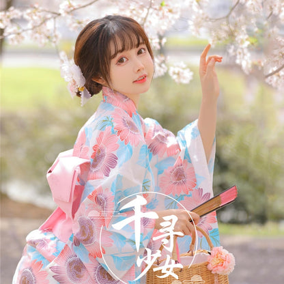 Side View of Model Wearing Kawaii Pink and Blue Floral Yukata