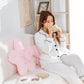 Model Sitting Against Our Cherry Blossom Plushie Pillow