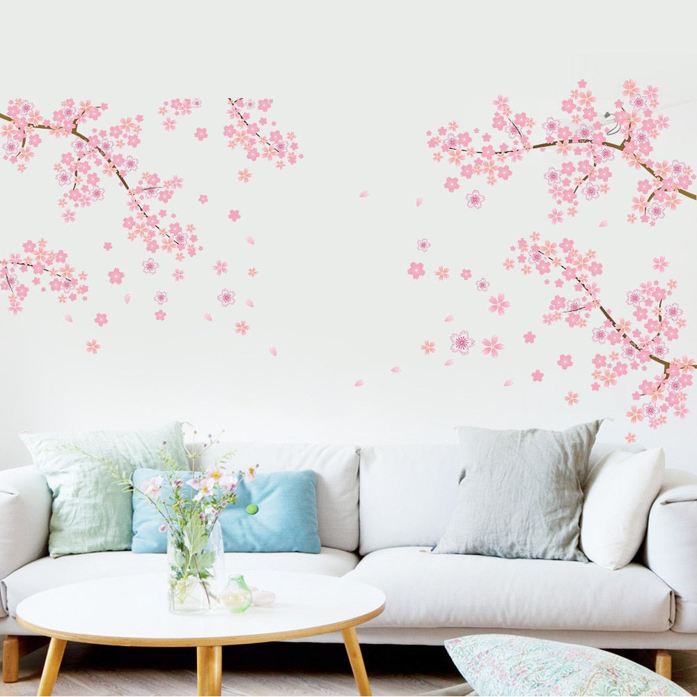 Two Kawaii Cherry Blossom Wall Decas Above a Couch