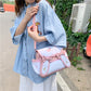 Model Wearing our Pink and White Bunny Purse