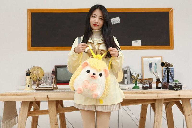 Model Holding Kawaii Yellow Hedgehog Plushie Backpack