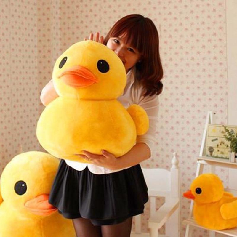 Model Holding Large Kawaii Yellow Ducky Plushie