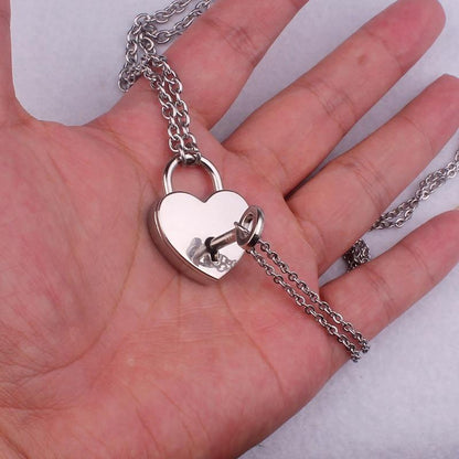 Hand Holding Heart Lock and Key Necklace