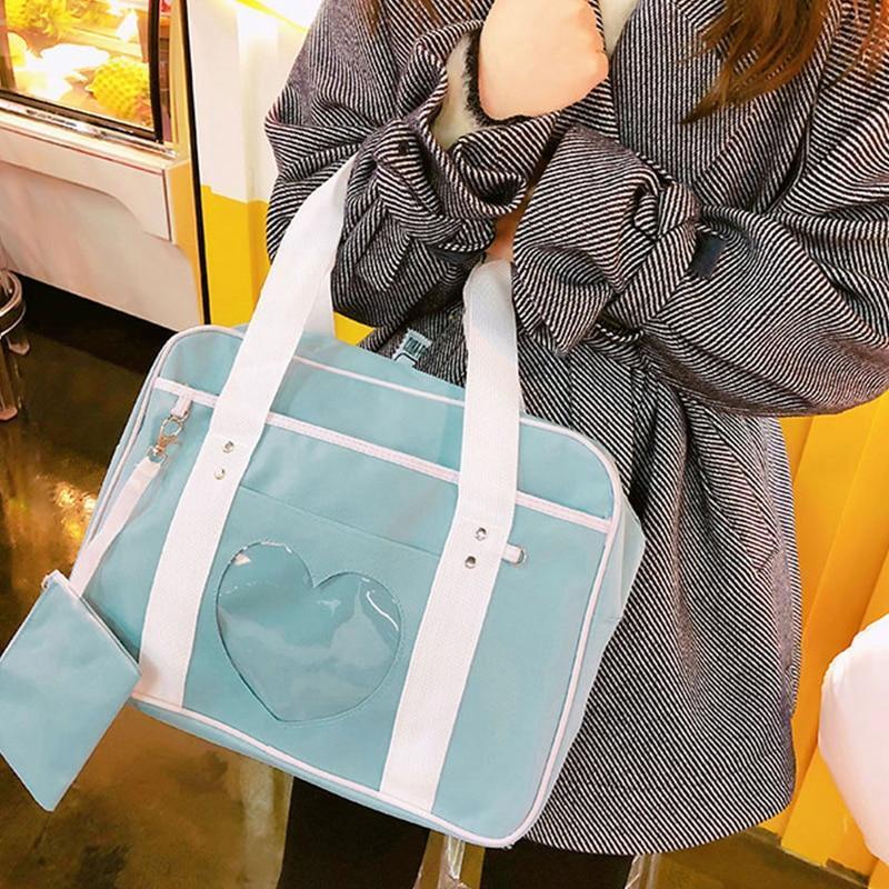 Girl Carrying Blue Kawaii Travel Heart Bag