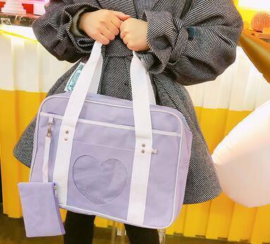 Girl Carrying Purple Kawaii Travel Heart Bag