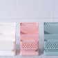 White, Pink, and Blue Phone and Pen Holders