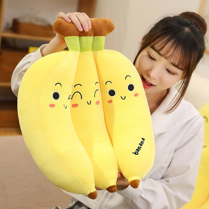 Girl holding cute banana bunch plushies