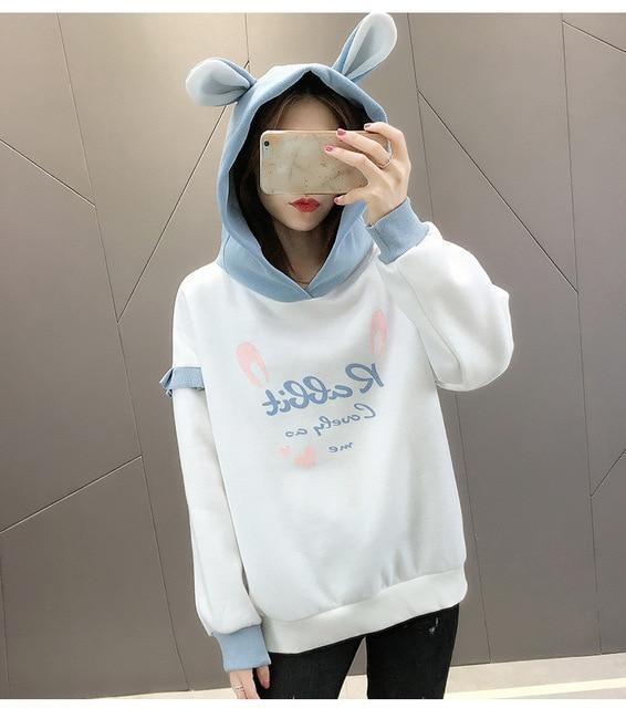 Model Wearing our White and Blue Rabbit Hoodie