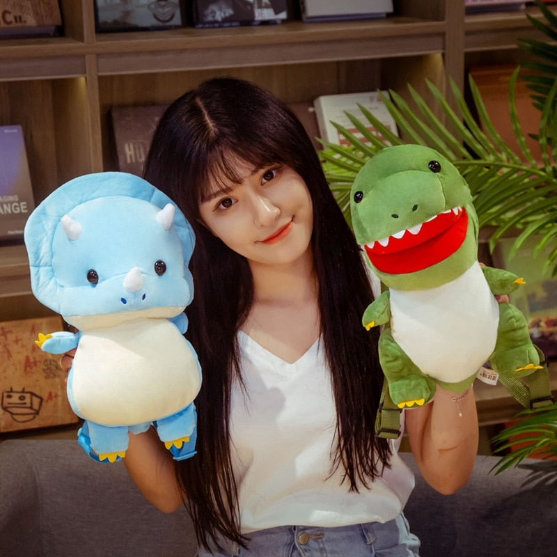Model Holding Kawaii Blue Triceratops and Green T-Rex Plushie Backpacks