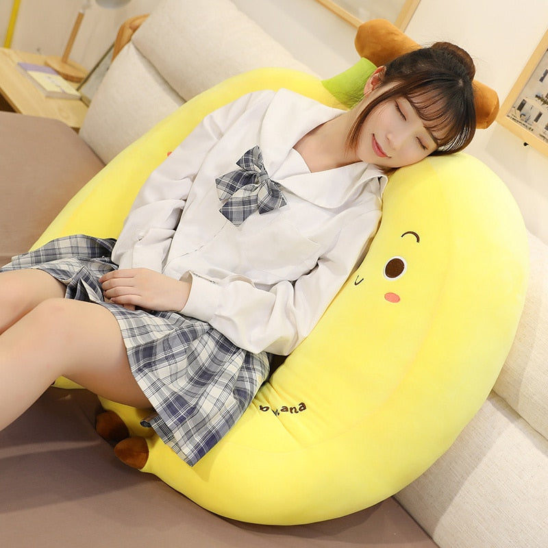Girl using Kawaii Banana Bunch Plushies as a pillow