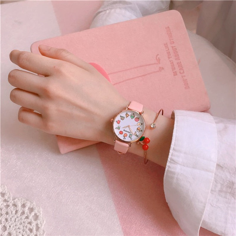Pink Kawaii Watch and Cherry Bracelet on a Wrist
