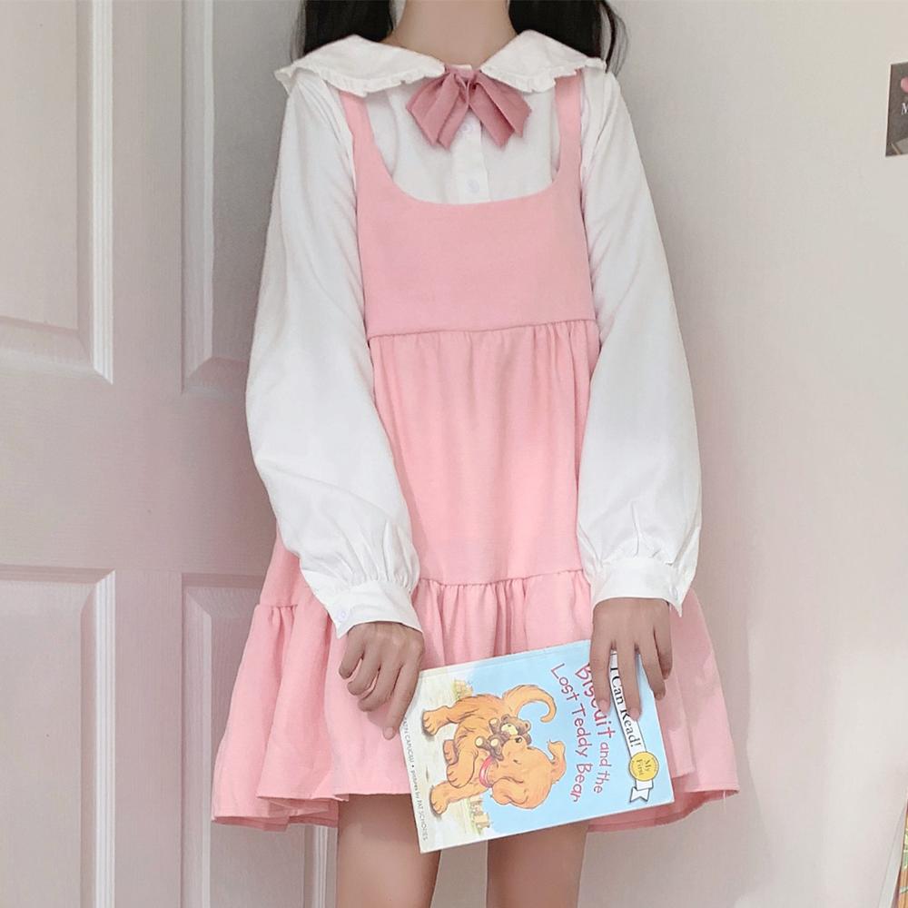 Girl Wearing Cute Bunny Suspender Dress With Collared Shirt