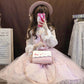 Lolita Girl Holding a Pink and White Kawaii Cherry Blossom Embroidered Purse