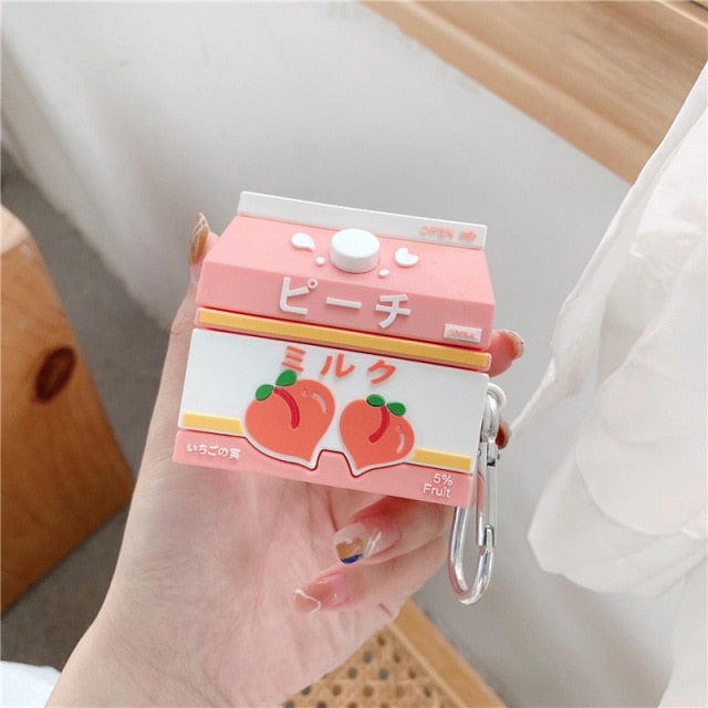 Hand Holding Kawaii Peach Milk Carton Airpods Case