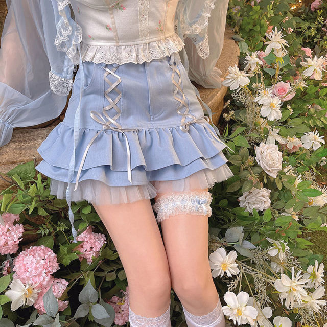 Model Wearing Lolita High Waist Skirt Surrounded By Flowers