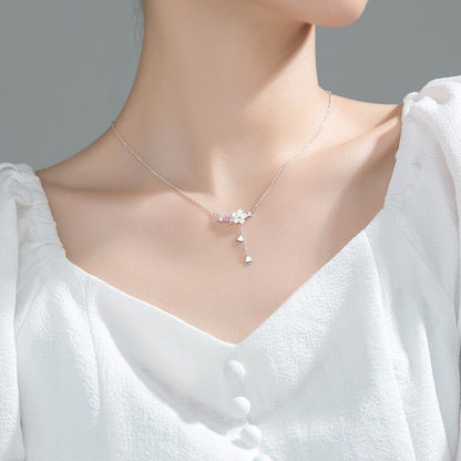 Model Wearing Our Sakura Drop Charm Pendant Necklace